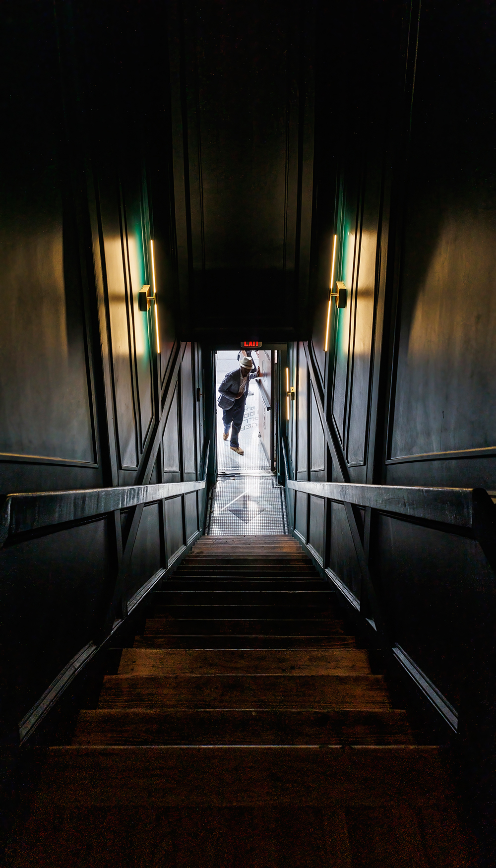 A dark, hidden staircase leads you to this upstairs speakeasy