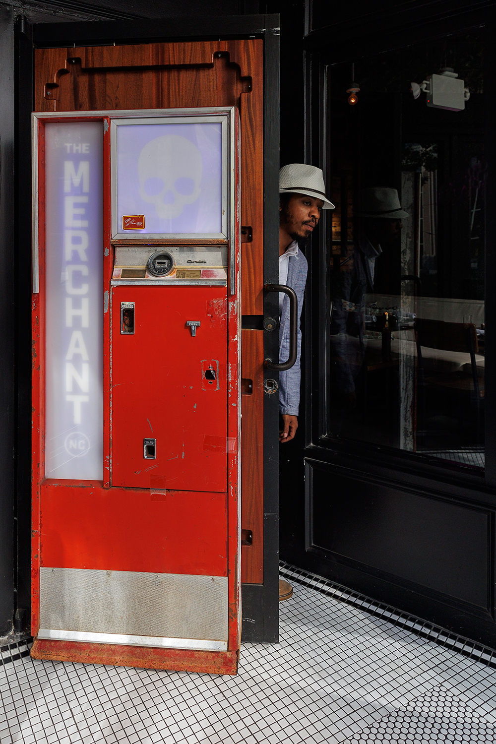 Guests enter the merchant through a secret door disguised as a vintage vending machine
