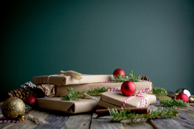 Wrapped gifts against a green background